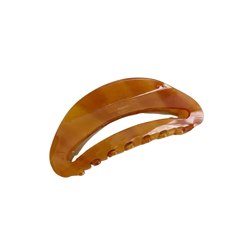 amber curved barrette hair clip for half-up hairstyle
